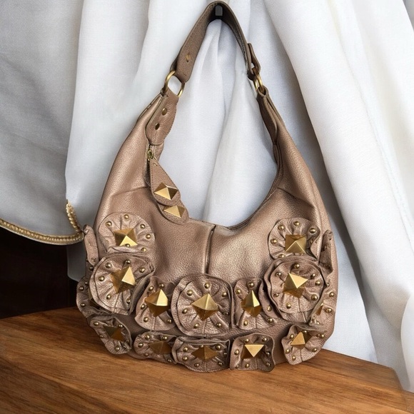 ISABELLA FIORE METALLIC CHAMPAGNE AND GOLD LEATHER STUDDED FLORAL HOBO BAG - Picture 1 of 11